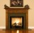 The Hanceville fireplace mantel is shown here with a granite facing kit.
