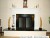 Installed fireplace mantel on a platform.