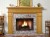 The Bridgeport custom fireplace mantel shown with brick facing.