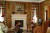 The Valinda thin cast stone fireplace mantel.