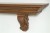 Detailed image of the acanthus leaf corbels in Red Oak, stained with our Chestnut Finish.
