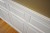 Custom two-tiered Raised Panel Wainscoting recently installed!