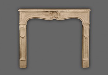 The Provence marble mantel has a beautiful shell as a center piece and long detailed but simple legs