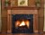 The Princeville custom fireplace mantel has smooth column legs that sit on a square base