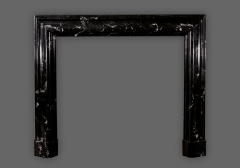 Amazing artwork crafted into the Bolection marble mantel.