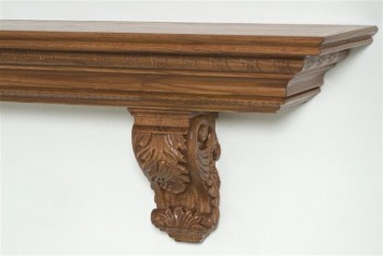 Detailed image of the acanthus leaf corbels in Red Oak, stained with our Chestnut Finish.