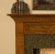 Beautiful crown molding on the header of the fireplace mantel.