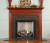 Available in different wood types and colors, the Gardendale custom fireplace mantel is preferred in wood mantel collection.