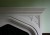 Nice geometric pattern in the spandrel of this Tudor stone mantel