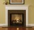Installed wood mantel with a granite facing kit.