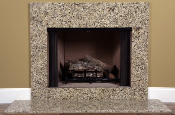 Venetian gold granite fireplace facing installed around a fireplace.