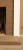 The legs of the Killen fireplace have an vertical fluted design.
