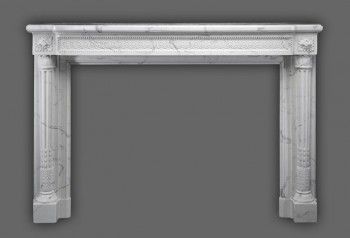 Marble mantel that is full of crafted details.
