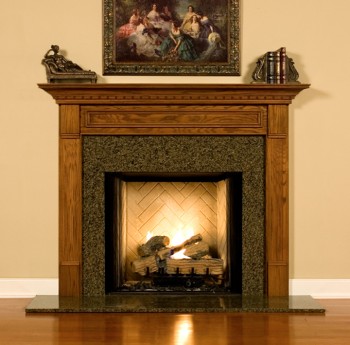 The Hanceville fireplace mantel is shown here with a granite facing kit.