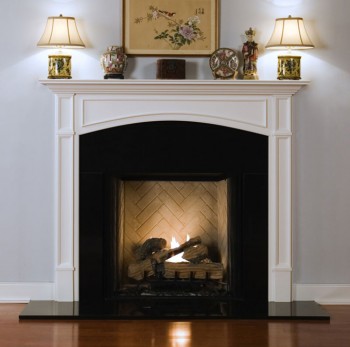 The framed legs and decorative molding makes this an exquisite fireplace mantel. Representative of the mantel design.